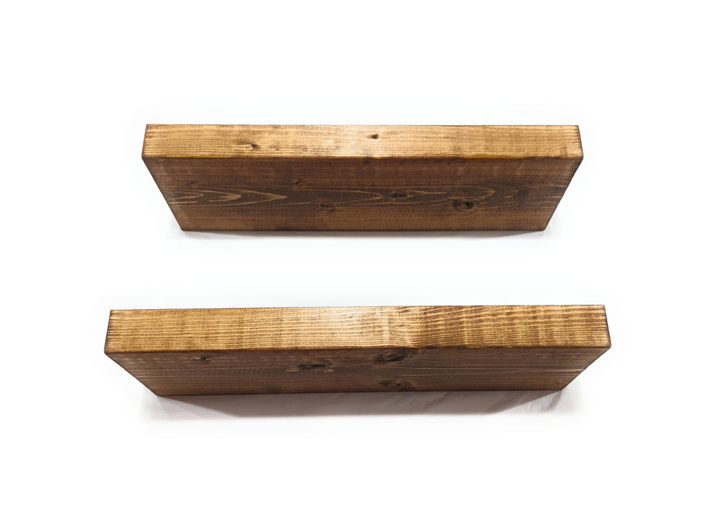 Two wooden shelves on a white background